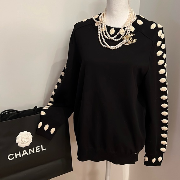 CHANEL Sweaters - CHANEL BLACK SWEATER with White Camilla Flowers Size 40